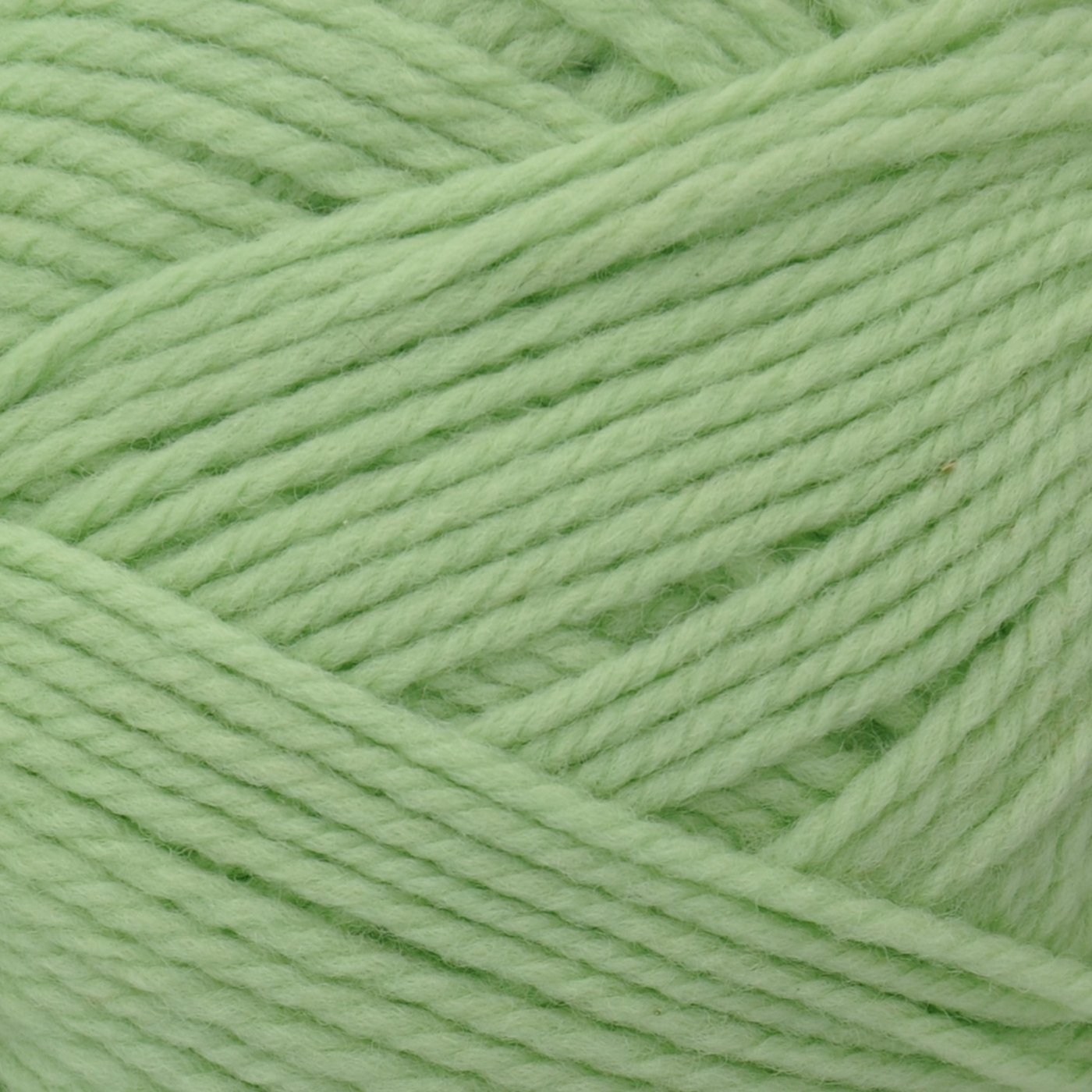 Brown Sheep Nature Spun Sport wool yarn skein, Honeydew soft pastel green — 184 yds at Revolution Fibers