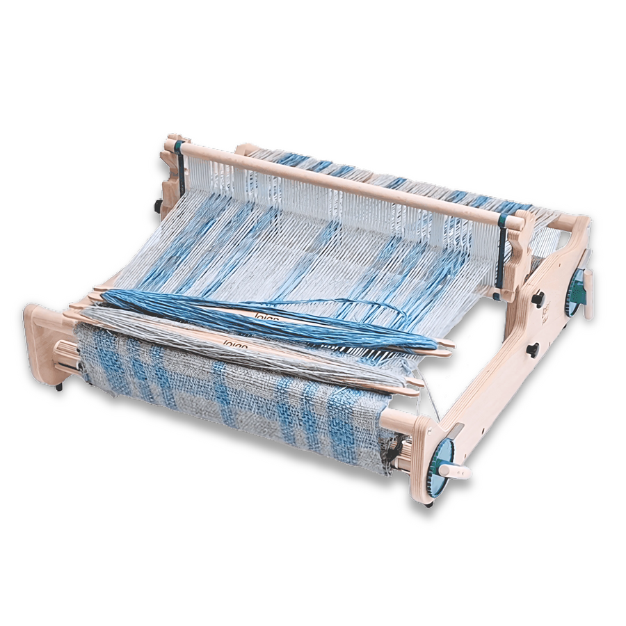 Lojan Flex Rigid Heddle Loom with blue yarn warp, showcasing compact and versatile weaving setup.