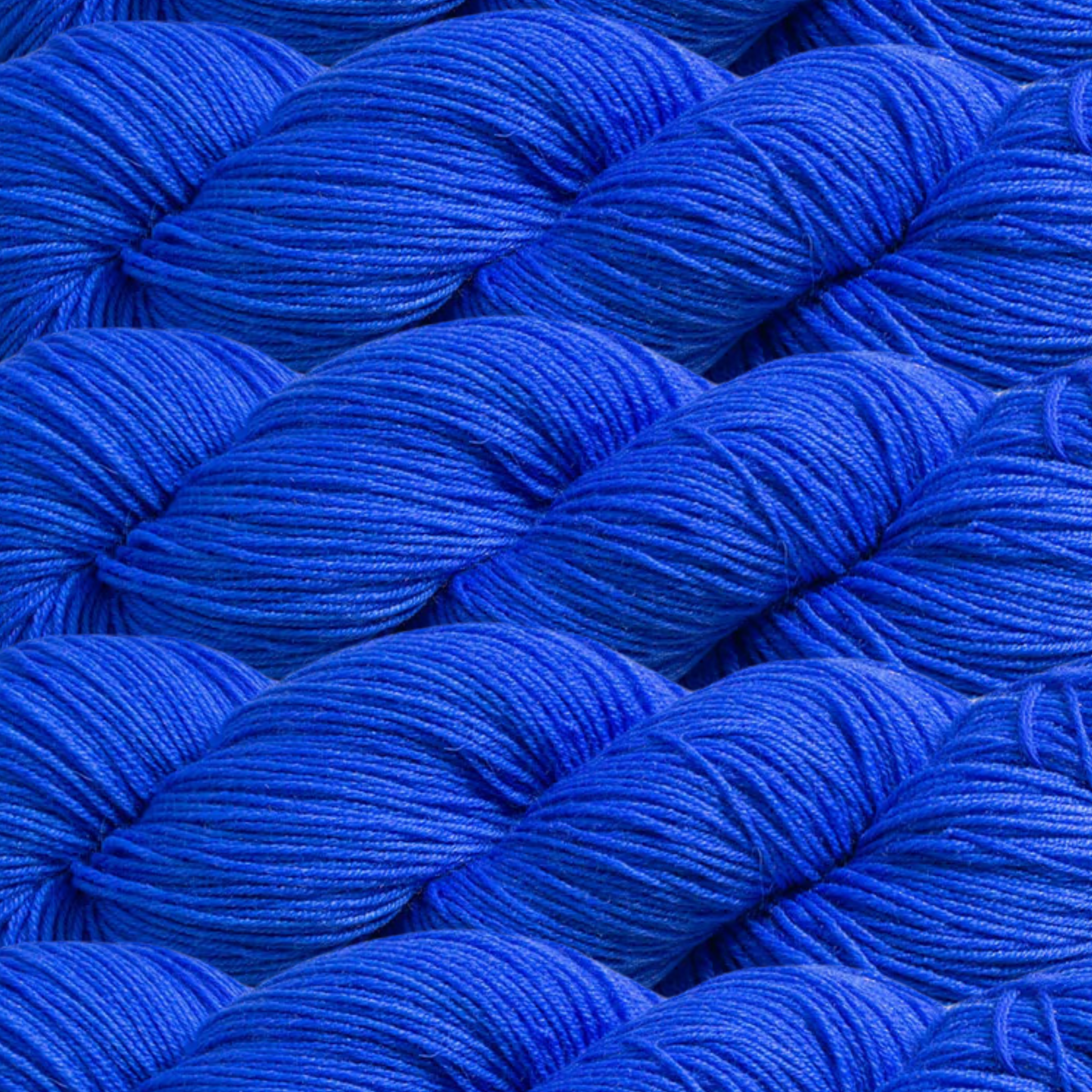 Heritage Yarn in Imperial Blue (1015), a deep, royal blue shade with rich, saturated tones. Crafted from Superwash Merino and Nylon, this fingering-weight yarn is ideal for weaving, knitting, and crocheting standout pieces. Offered in 1 lb. cones with 1,996 yards for unmatched versatility and project potential.