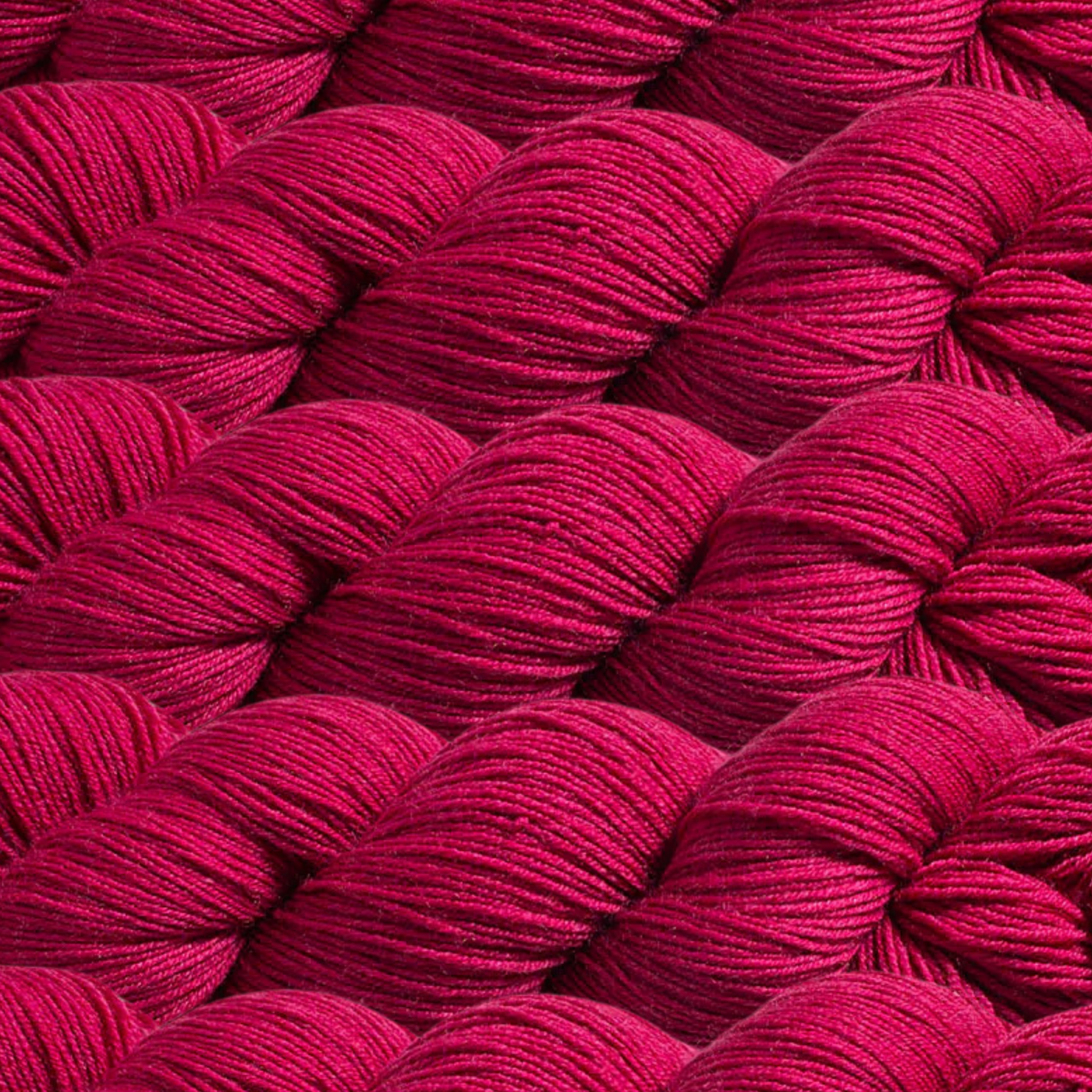 Heritage Yarn in Claret (1037), a rich, deep red with subtle undertones of wine that adds sophistication to your projects. Made from Superwash Merino and Nylon, this fingering-weight yarn ensures durability and smooth handling. With 1 lb. cones providing 1,996 yards, it's ideal for weaving, knitting, and crocheting refined creations.