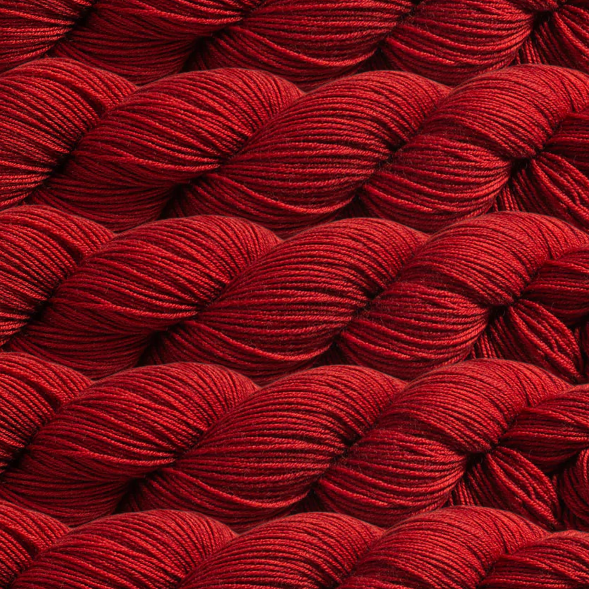 Heritage Yarn in Rustic Red (1049), a warm and earthy red tone perfect for adding depth and richness to your projects. Made from a Superwash Merino and Nylon blend, this fingering-weight yarn is ideal for knitting, crocheting, and weaving. Offered in 1 lb. cones with 1,996 yards for endless creativity.