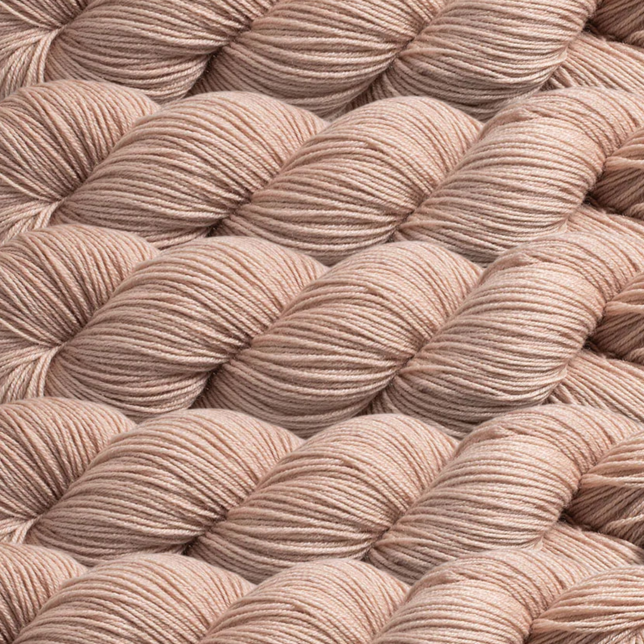 Heritage Yarn in Light Taupe, a soft and neutral beige tone perfect for creating timeless and versatile projects. Crafted from a Superwash Merino and Nylon blend, this fingering-weight yarn is ideal for knitting, crocheting, and weaving. Supplied in 1 lb. cones with 1,996 yards for limitless crafting possibilities.