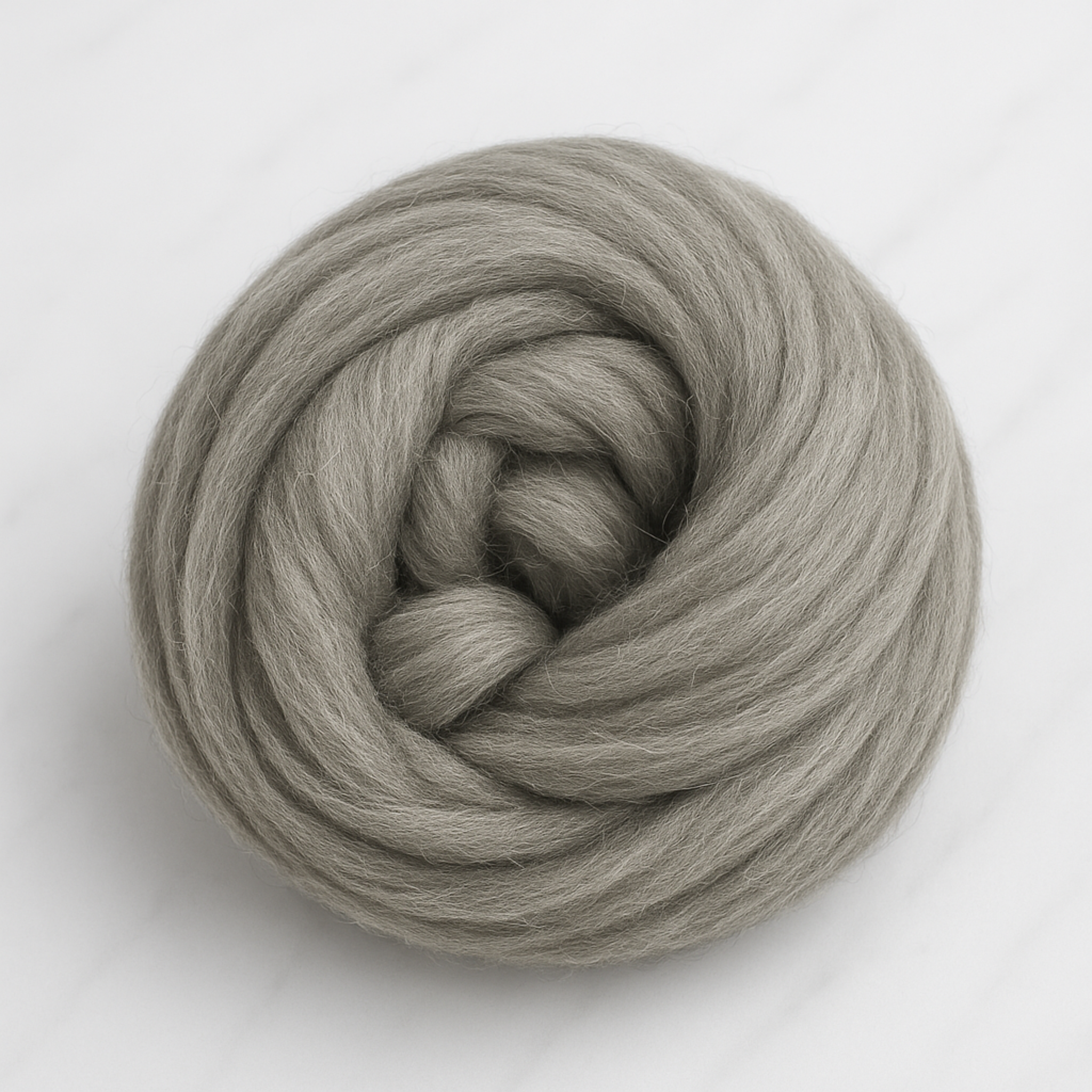 Coiled bundle of natural gray Corriedale combed top—1 lb undyed roving prepared for hand-spinning, blending, felting, and weaving.