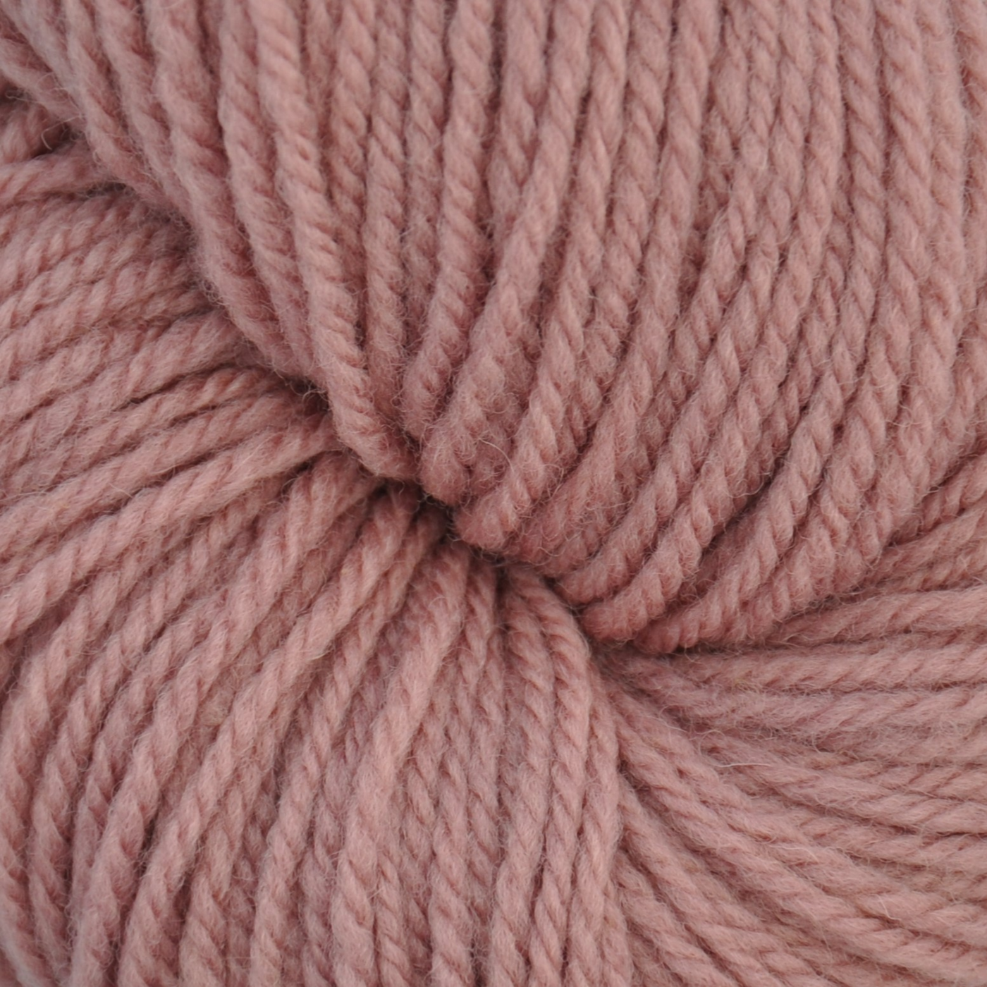 Brown Sheep Prairie Spun DK yarn skein, Desert Rose dusty pink colorway close-up