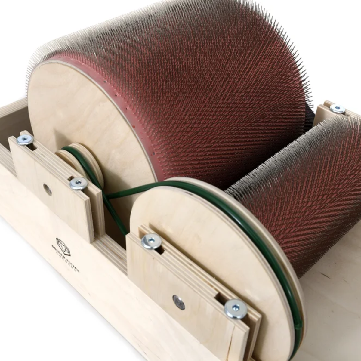 Drive-side view of the Golden Fleece standard 120 TPI drum carder showing the drums, frame, and belt system.
