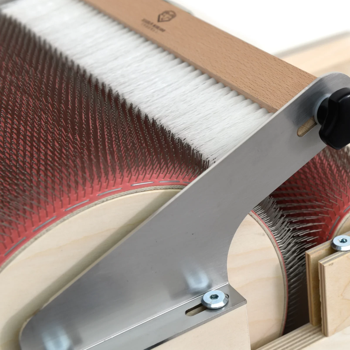 Golden Fleece WIDE 120 TPI drum carder with Packer Brush positioned over the fine main drum carding cloth.