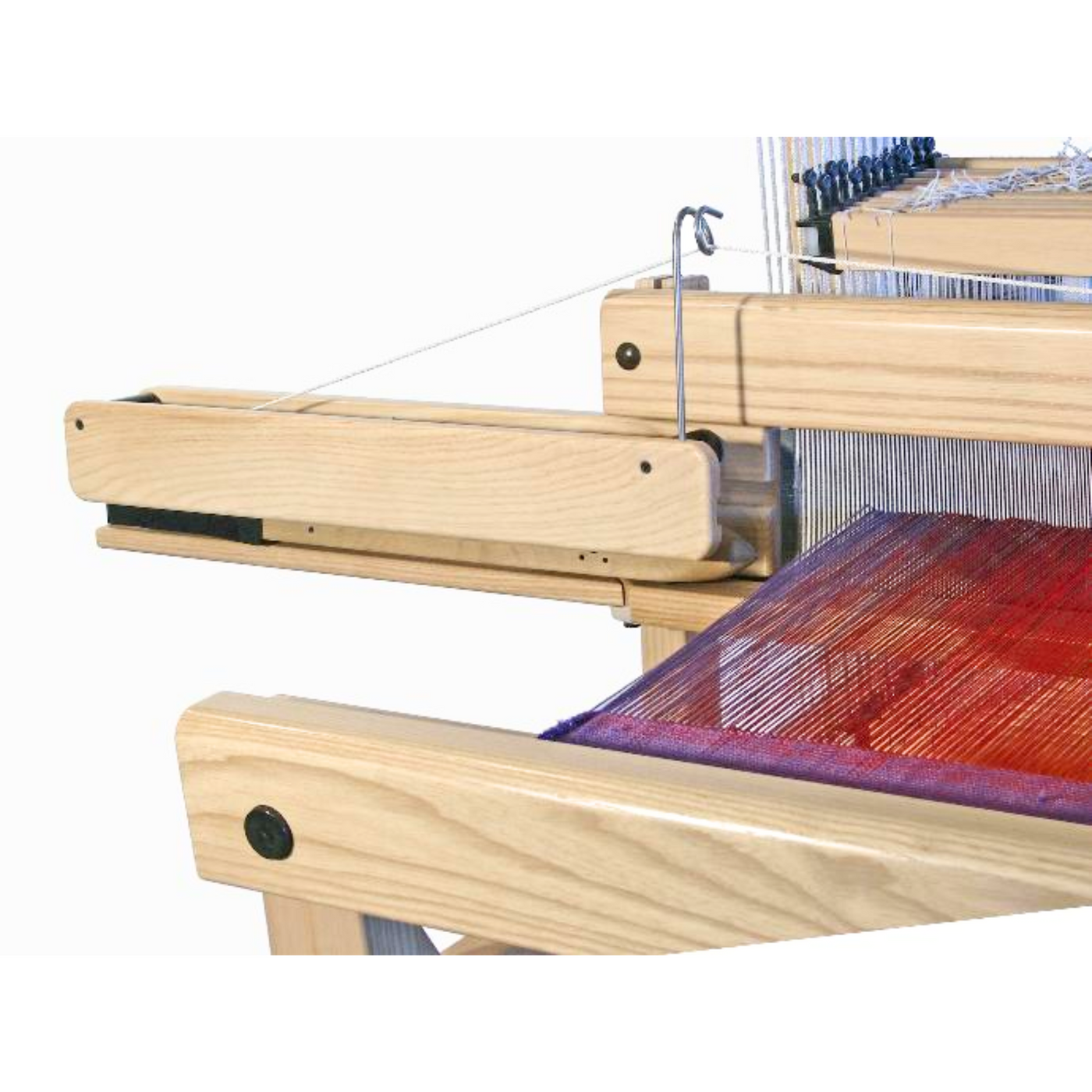 Louët Delta Floor Loom front view showing cloth beam advancing with woven fabric