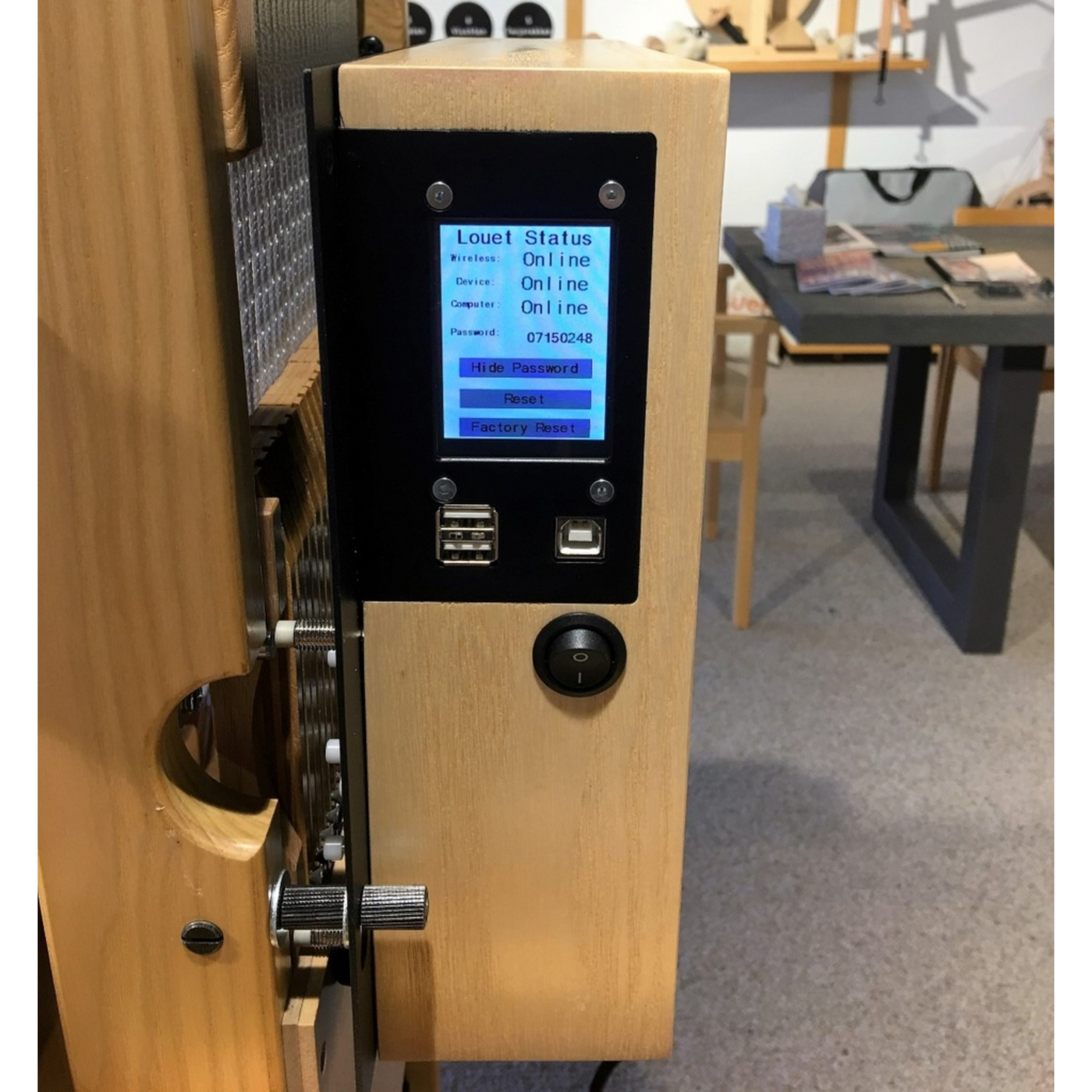 Louet Megado V2 Electronic Dobby Head detail showing digital screen and control panel.