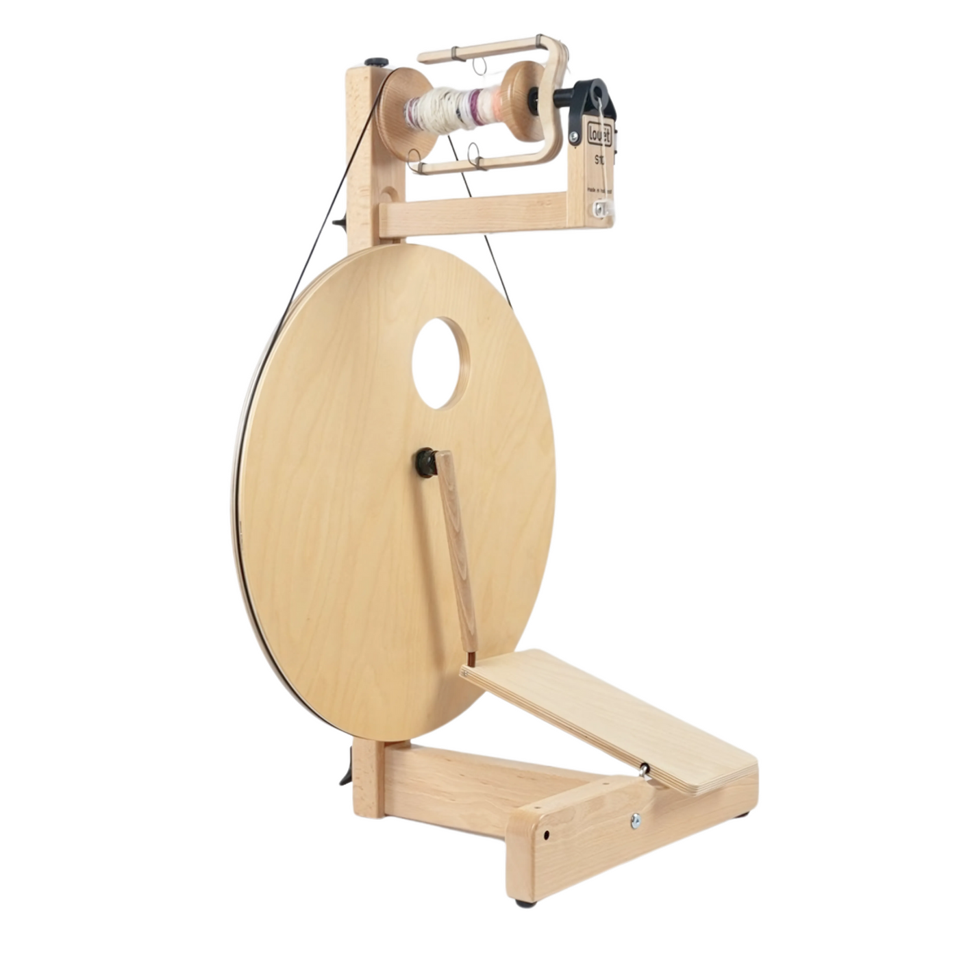 Side profile of the Louet S10 Single Treadle Spinning Wheel with Irish tension, highlighting the ergonomic treadle and precision flyer.