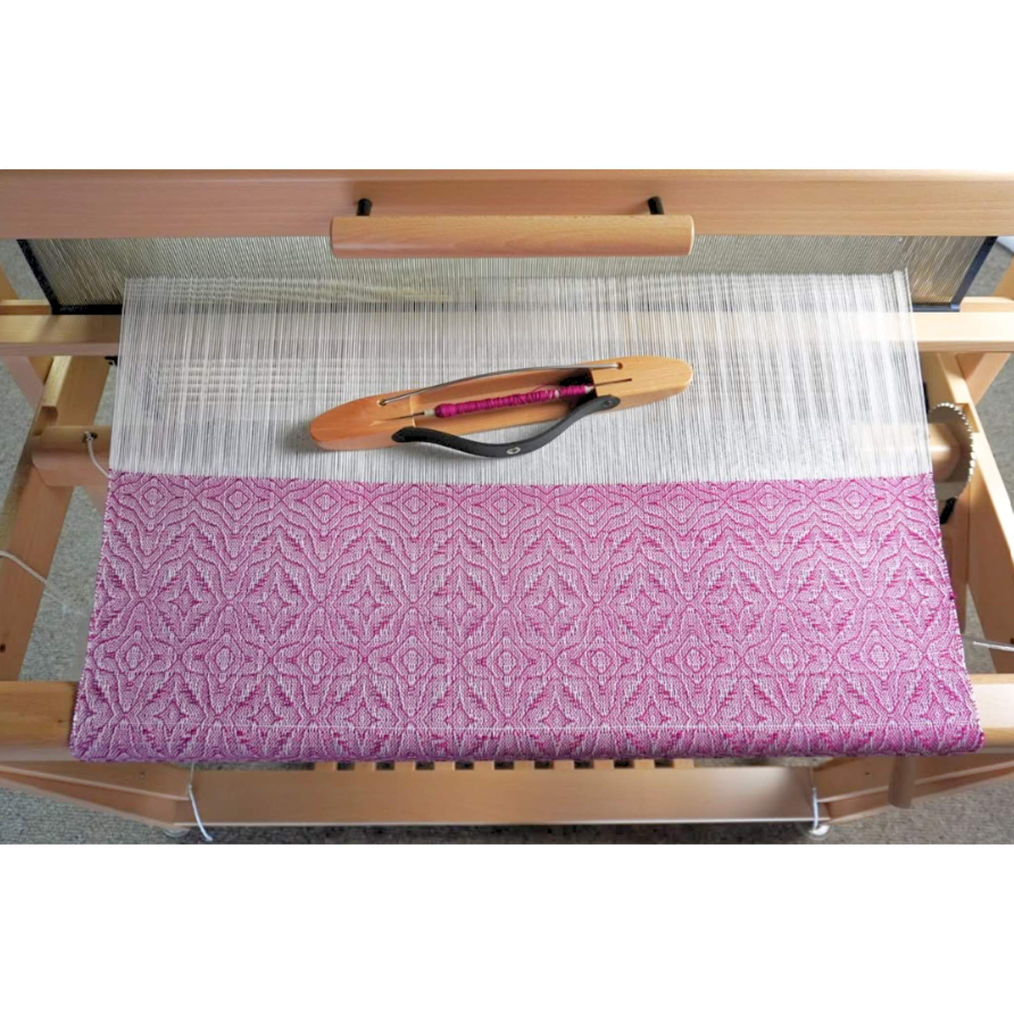 Top angle of Louët Spring II loom highlighting beater, breast beam and sliding bench rails