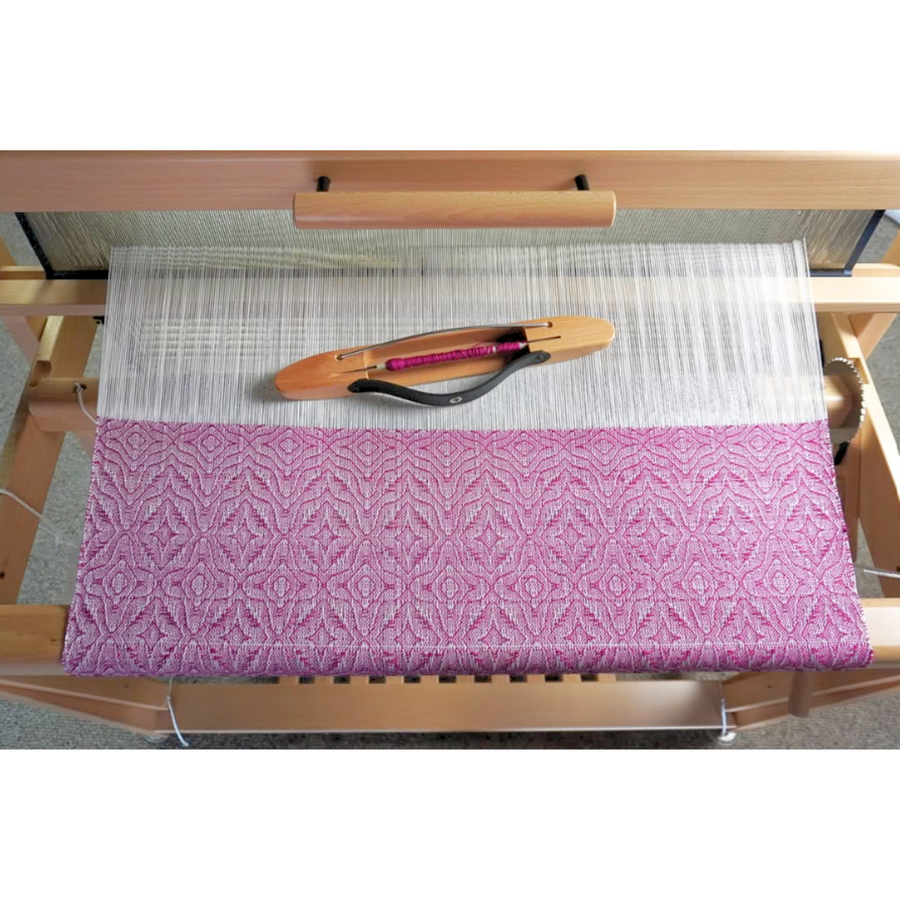 Top angle of Louët Spring II loom highlighting beater, breast beam and sliding bench rails