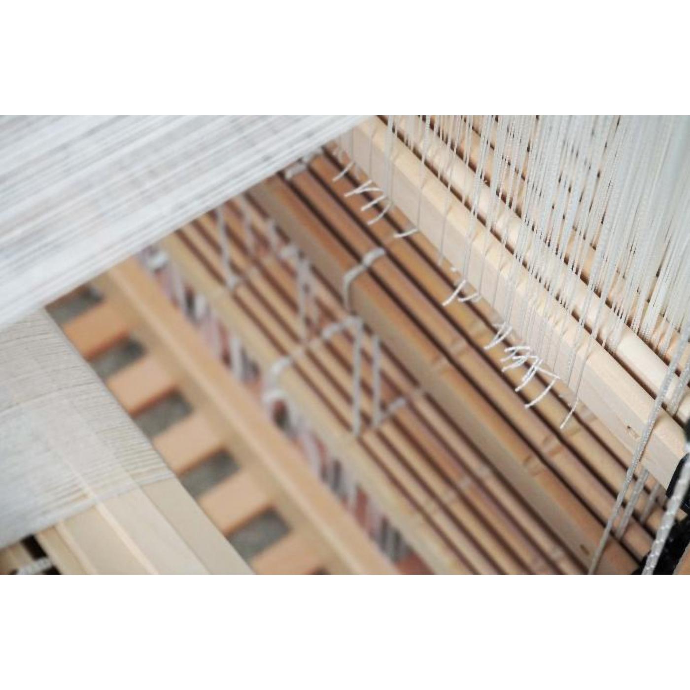 Interior view of Spring II lamms, treadles and texsolv tie‑ups demonstrating parallel countermarch action