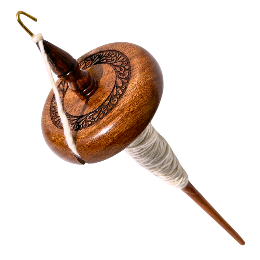 Revolution Fibers premium top whorl drop spindle with an 12-inch shaft and 3.25-inch whorl, perfect for beginner hand spinning and fine yarn production.