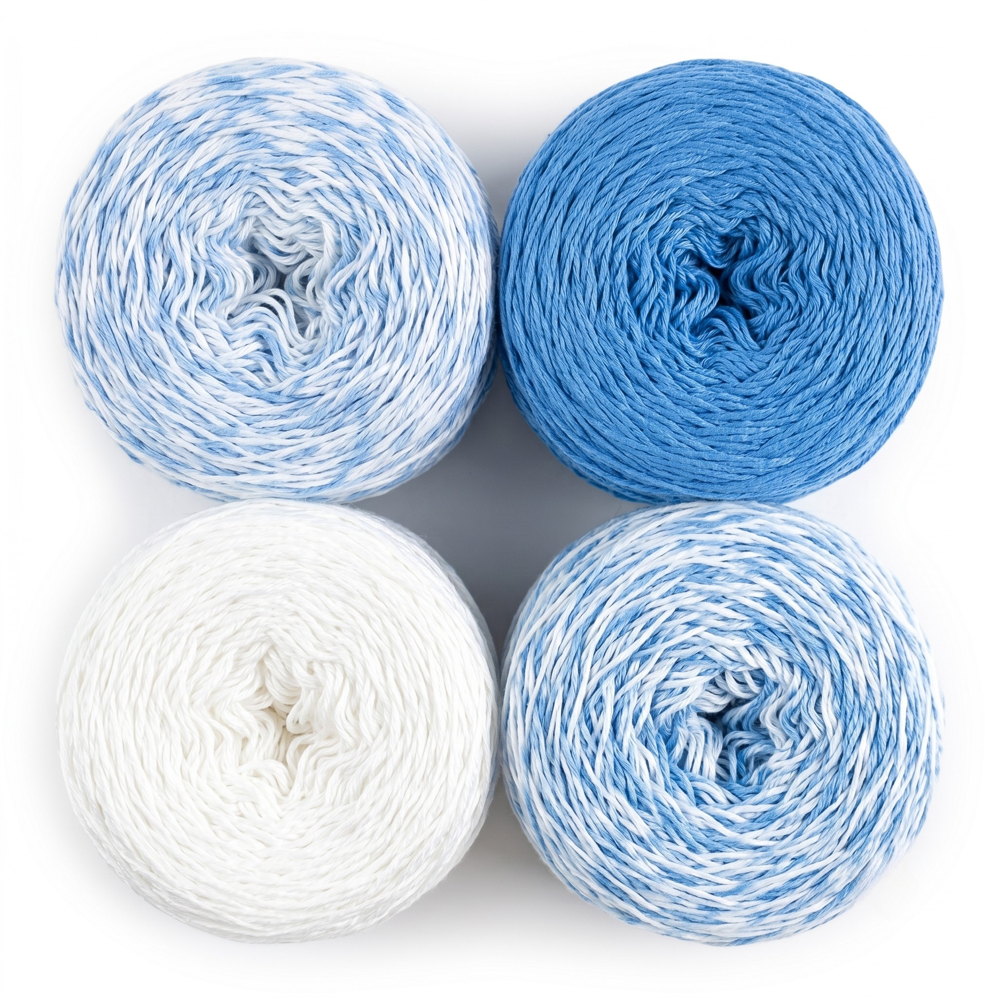 Revolution Fibers Baby Bloom Gradient Baby Blanket Kit Heron Lake yarn cakes shown from above in a 2x2 grid.