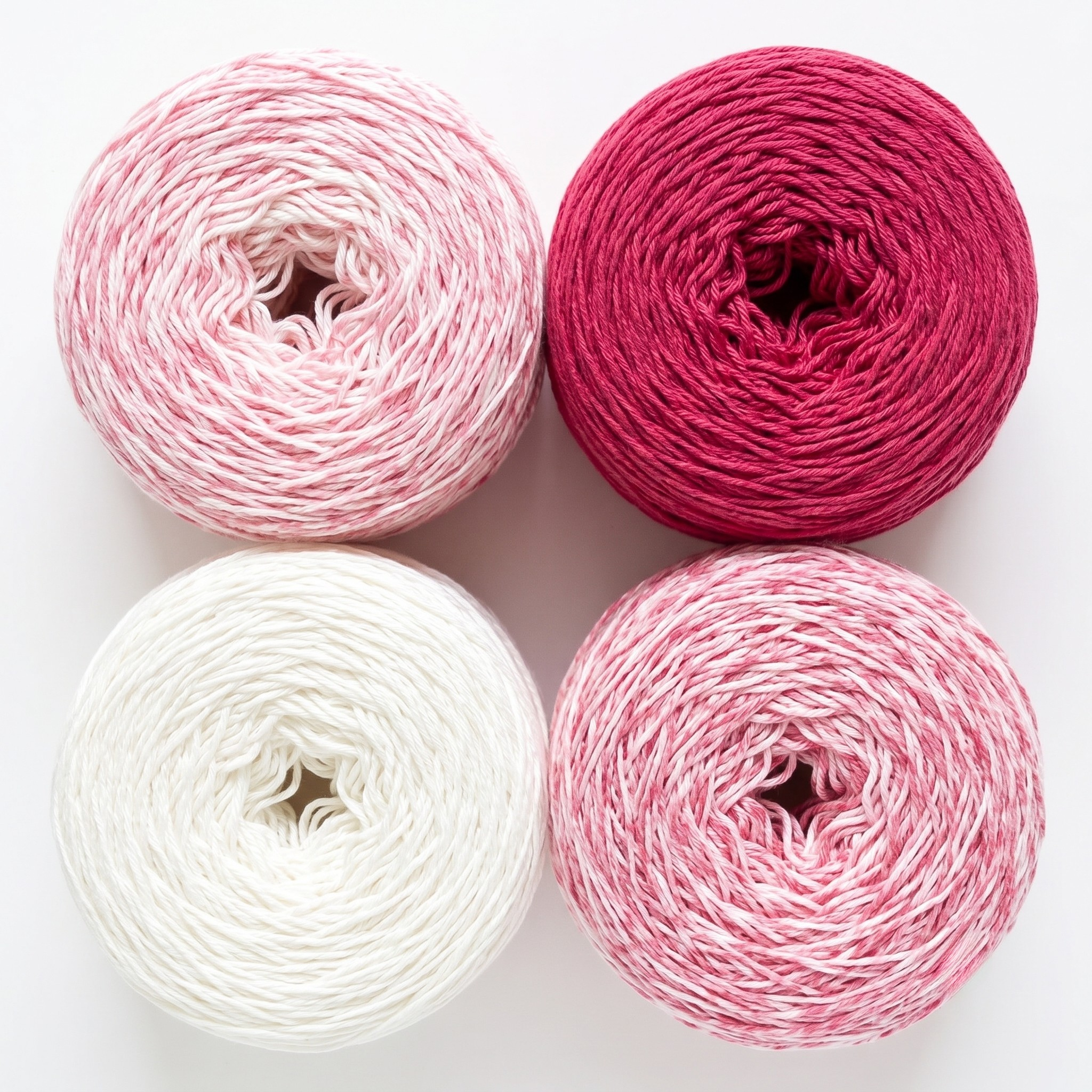 Revolution Fibers Baby Bloom Gradient Baby Blanket Kit Rose Dust yarn cakes shown from above in a 2x2 grid.