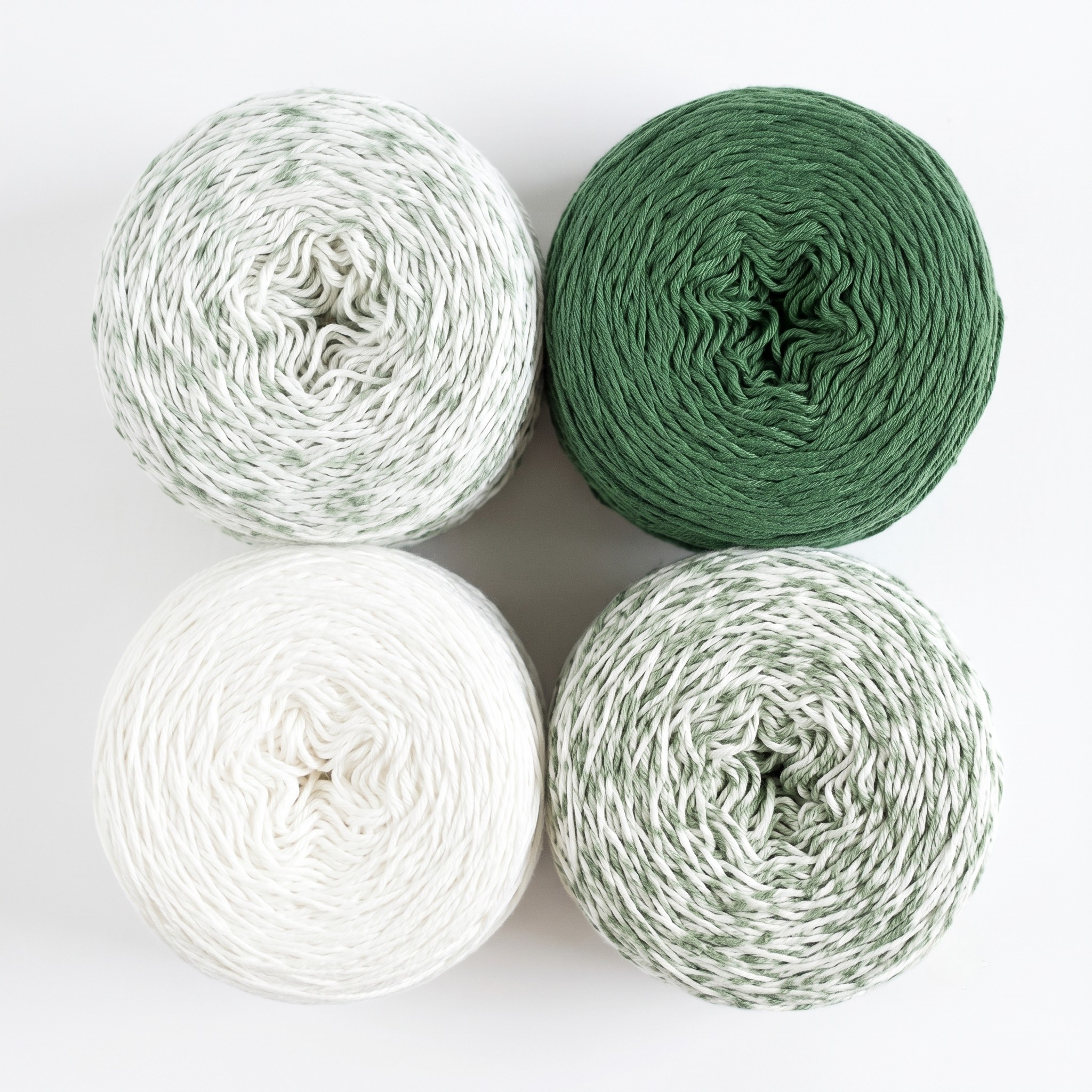 Revolution Fibers Baby Bloom Gradient Baby Blanket Kit Spring Leaf yarn cakes shown from above in a 2x2 grid.