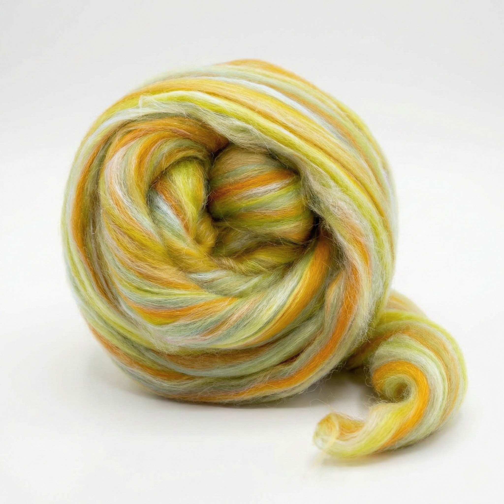 Orion Yellow Constellation Range roving, 8 oz 70% dyed merino and 30% tussah silk (21 micron), studio swirl on white background.