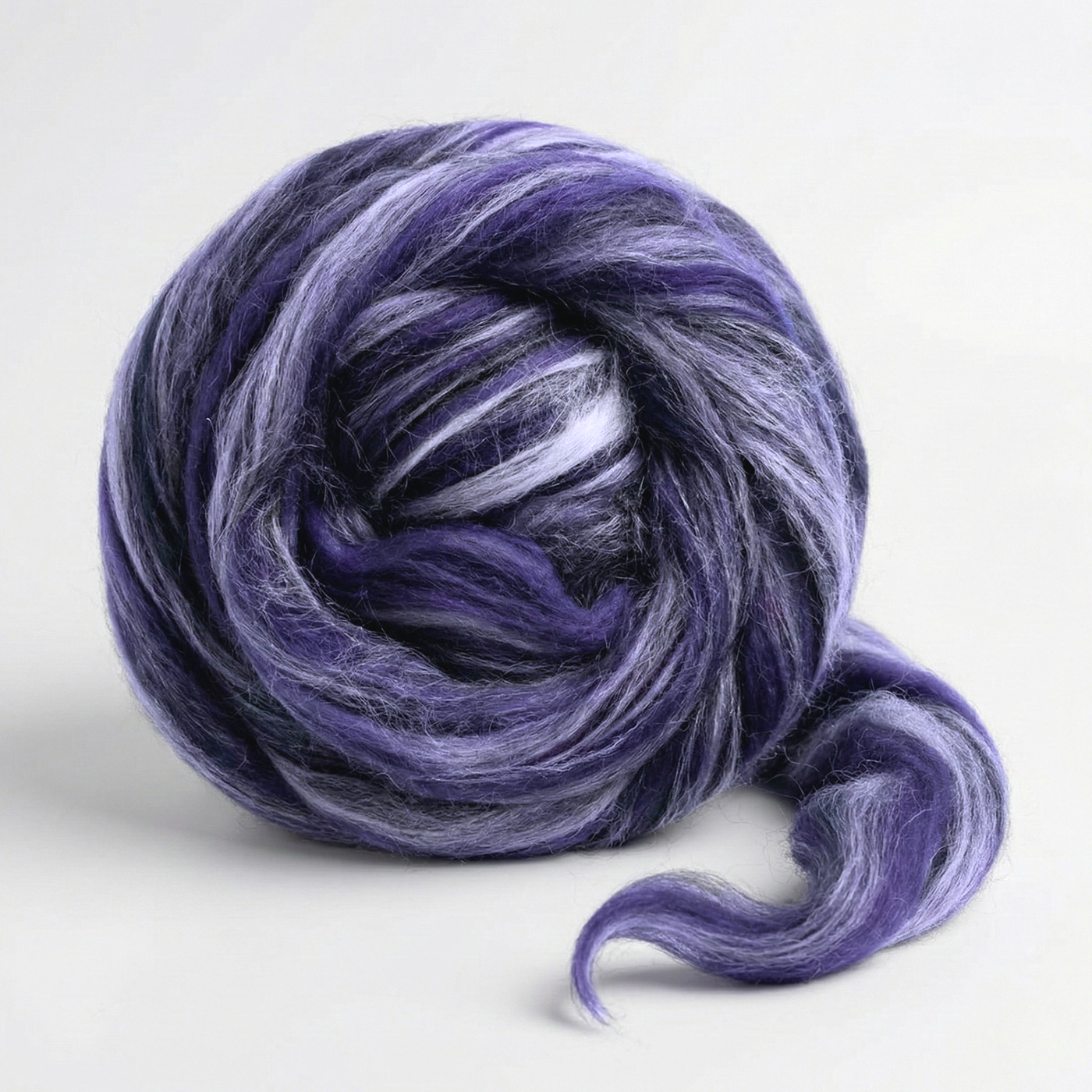 Taurus Purple Constellation Range roving, 8 oz 70% dyed merino and 30% tussah silk (21 micron), studio swirl on white background.