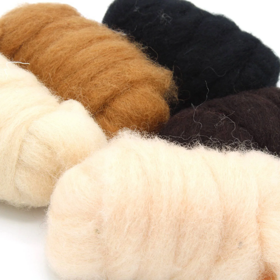 Angled closeup of Revolution Fibers Critter Classics Carded Corriedale Wool Sliver Variety Pack – includes Sandstone, Eggshell, Sienna, Mocha, and Raven animal fur tone fibers for realistic needle felting, spinning, and fiber crafts.
