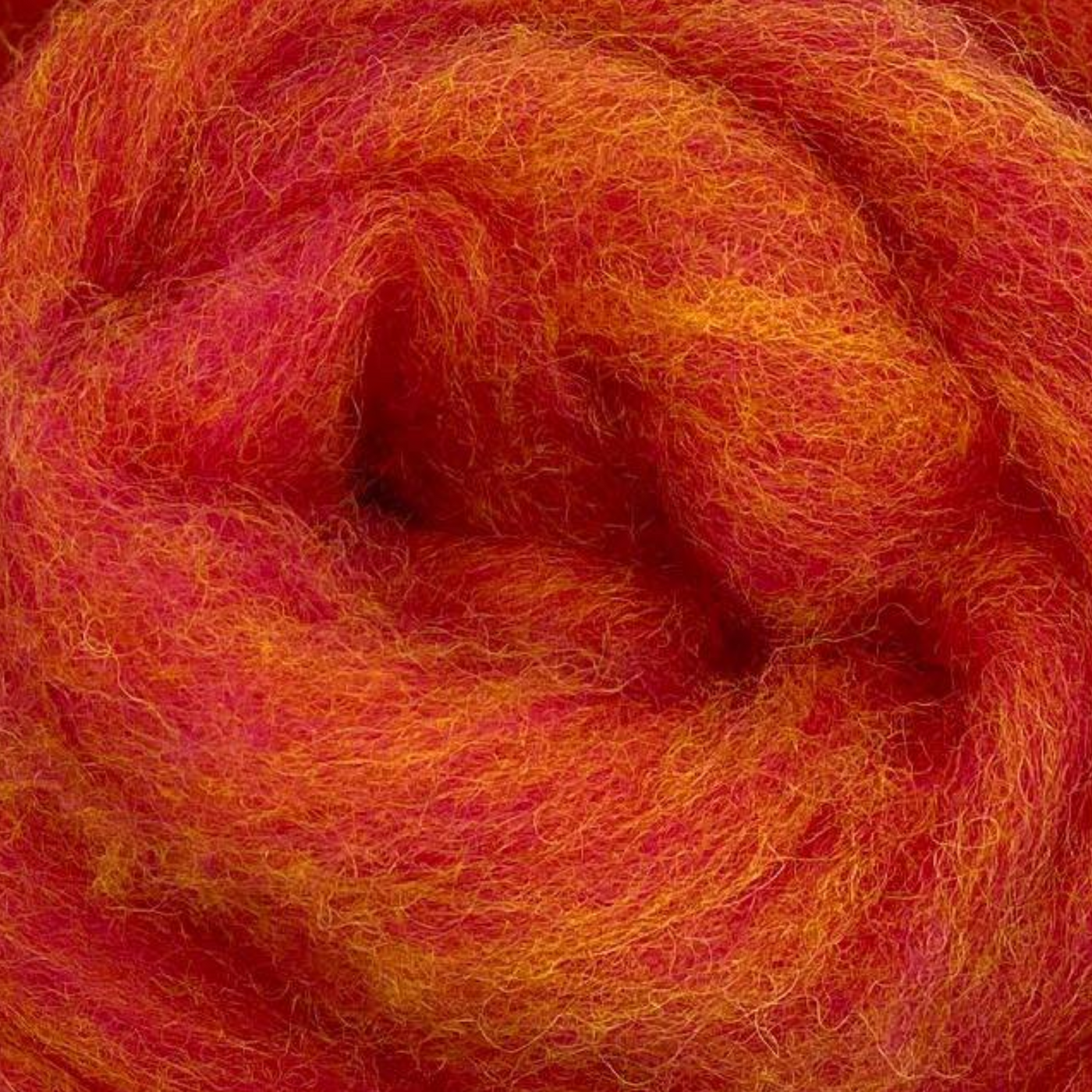 Peach Melba coral orange Corriedale wool sliver from Revolution Fibers Retro Pop pack – soft, springy fiber for unique felting and spinning projects