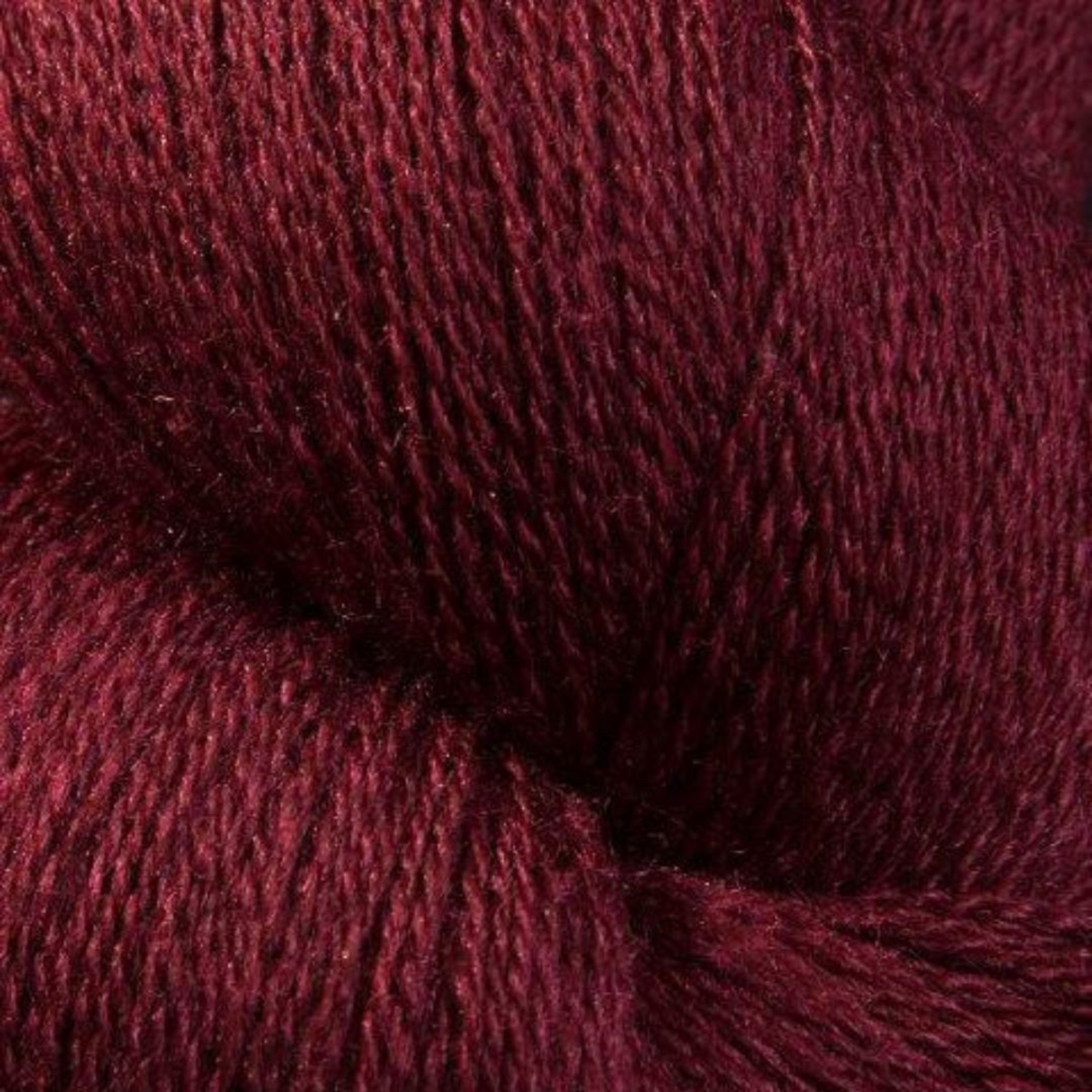 Zephira 2/18 wool-silk lace cone in Ruby; deep gemstone red with refined luster, 1 lb approx 5,040 yards.