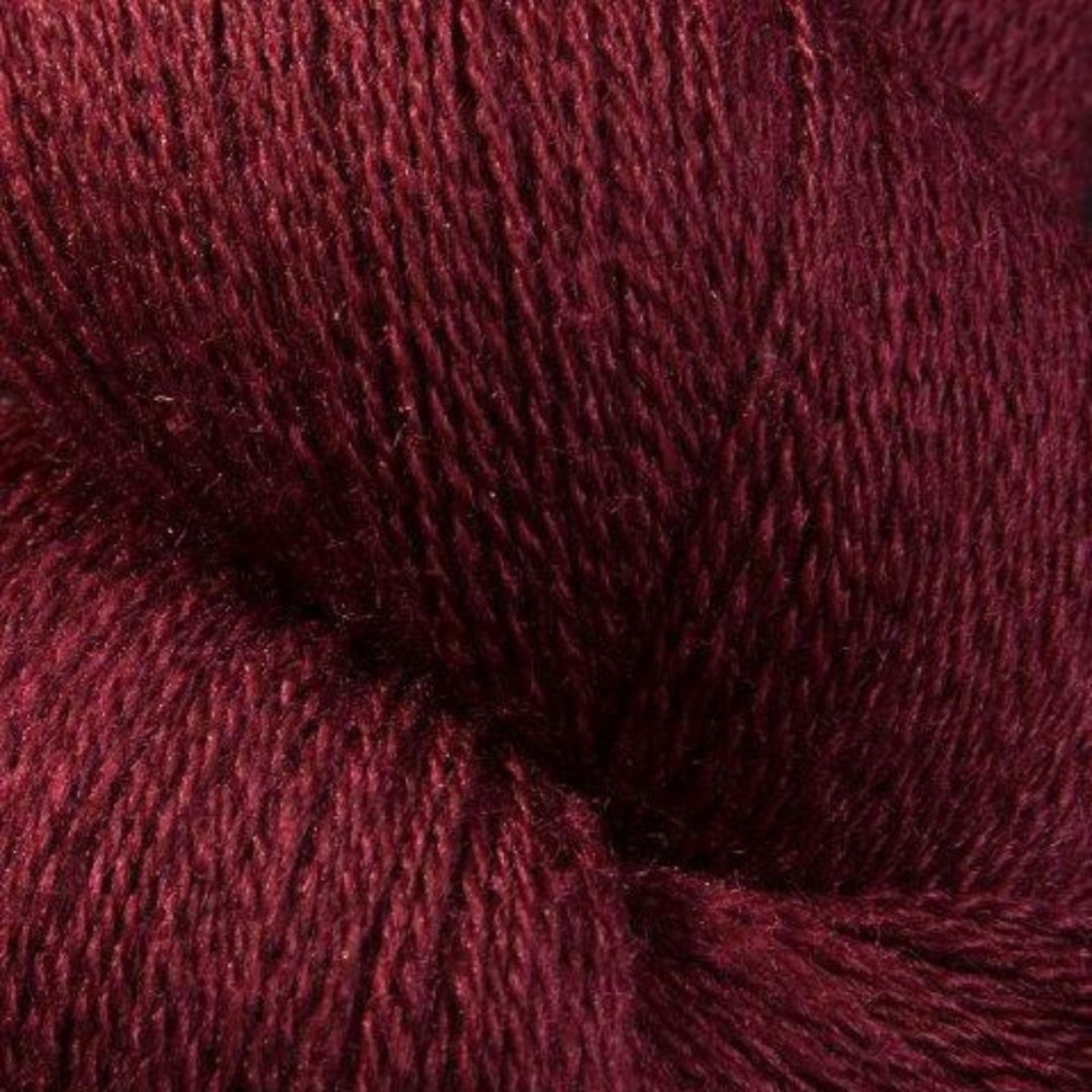 Zephira 2/18 wool-silk lace cone in Ruby; deep gemstone red with refined luster, 1 lb approx 5,040 yards.