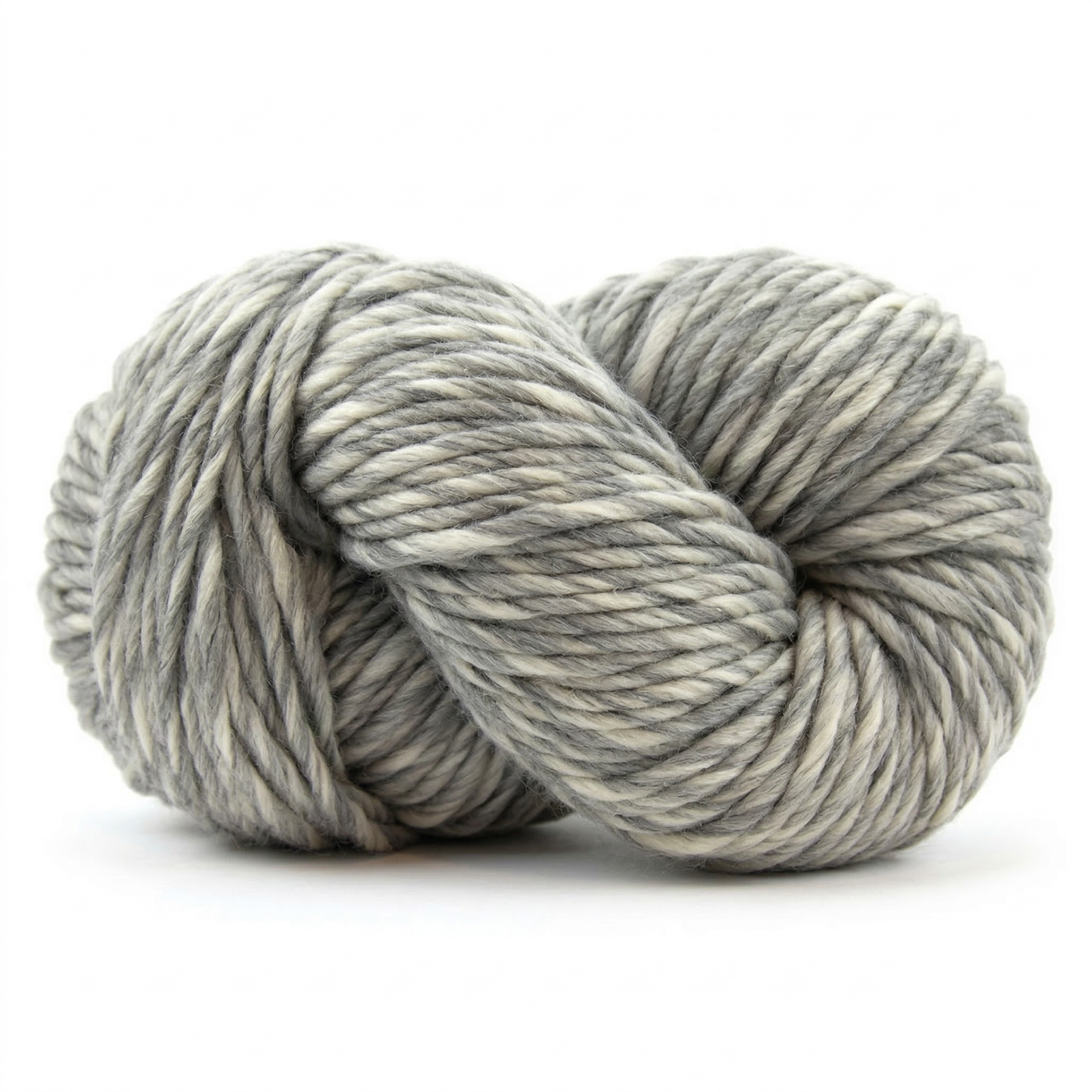 Humbuggier Gray super bulky multicolor merino wool yarn skein in a soft twisted pose on a light neutral background.