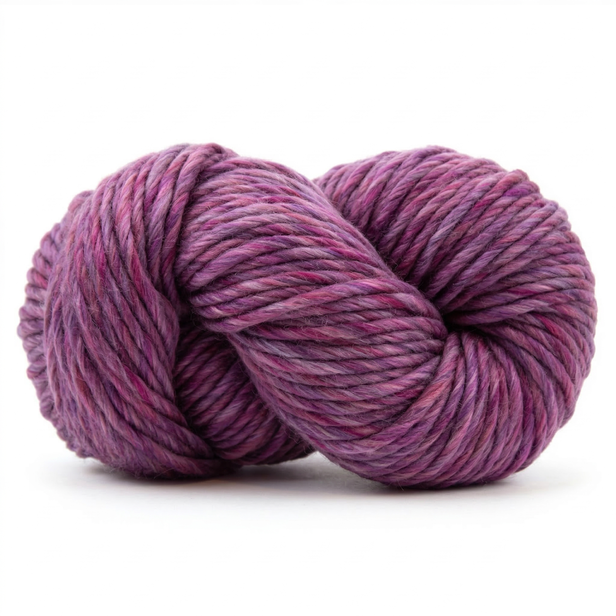 Whisper Pink super bulky multicolor merino wool yarn skein in a soft twisted pose on a light neutral background.